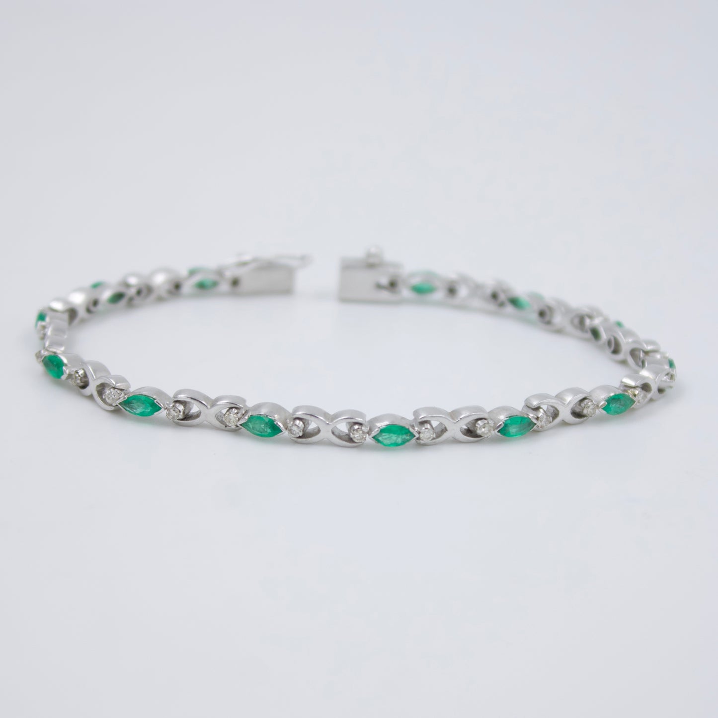 Natural Emerald & Diamond Tennis Bracelet in 18K White Gold